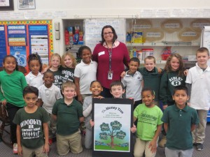 FMFCU Educator Tricia McAllister with Woodlyn Elementary students following a financial education lesson